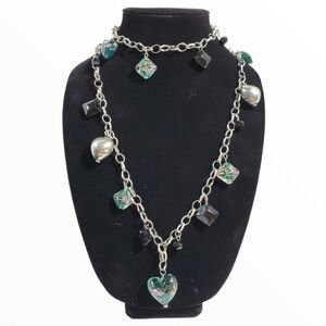 Silvertone long infinity fashion charm station necklace